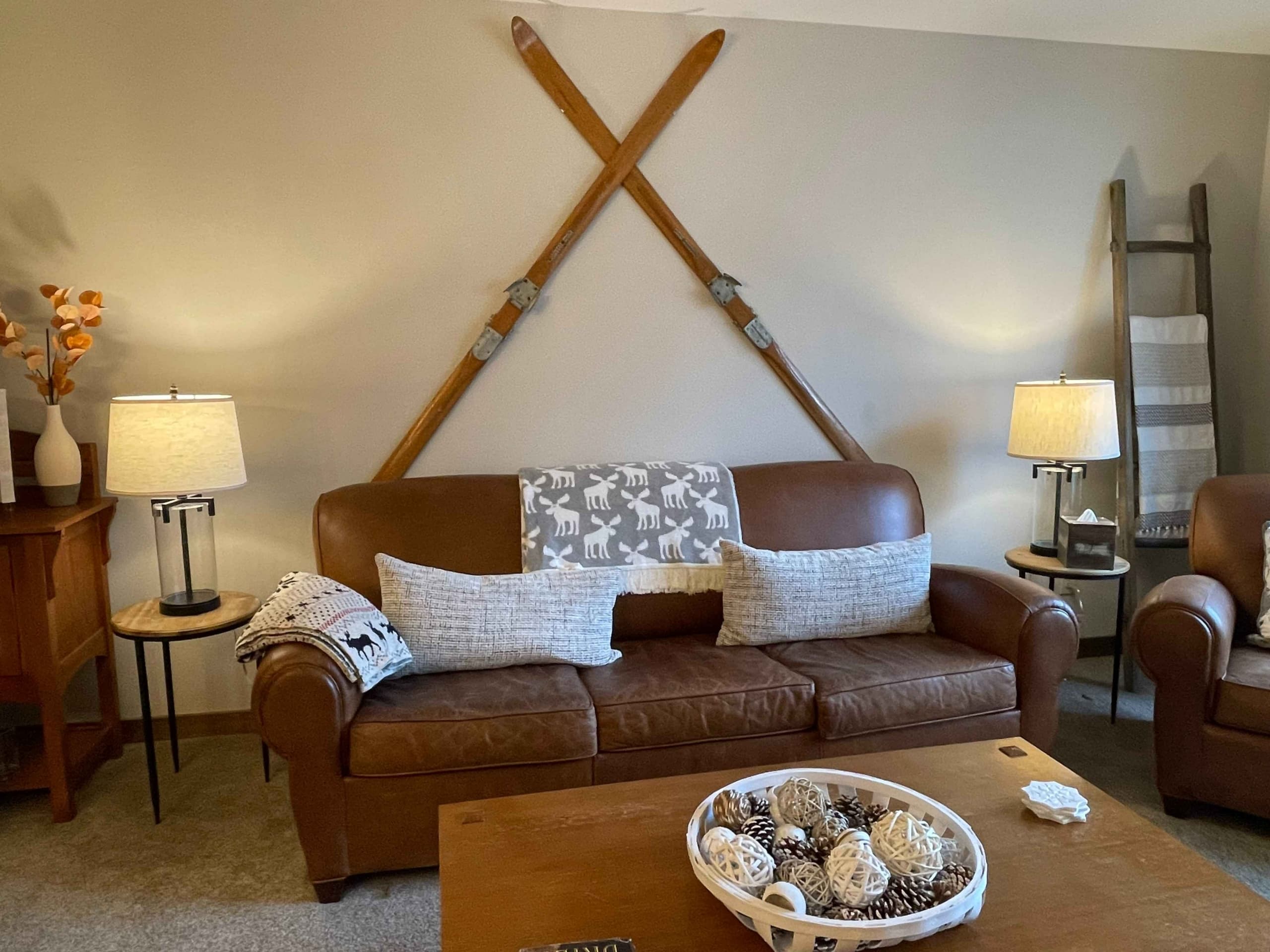 Skis hanging above the living room couch